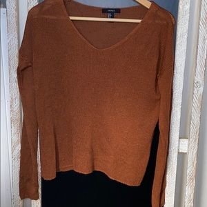 Lightweight sweater blouse.